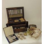 A good quality early 20th century oak cutlery canteen, the lid with inset plaque reading presented