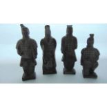 A collection of four Chinese terracotta models of male characters with black painted finish