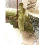 A weathered cast composition stone garden ornament in the form of a classical female standing figure