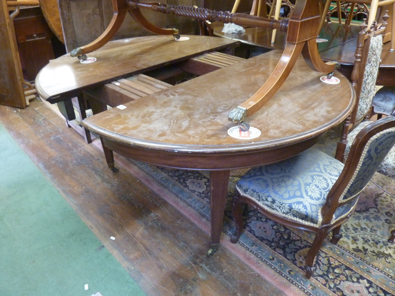 An extending Victorian mahogany D-end dining table raised on four square tapered legs, 130cm wide ( - Image 2 of 2