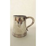 A George V silver tankard, Goldsmiths & Silversmiths Co. Ltd, London, 1920, of plain tapering