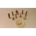 A collection of Royal Doulton Bunnykins figures, Harry Bunnykins DB73, Bedtime Bunnykins DB55, Tom