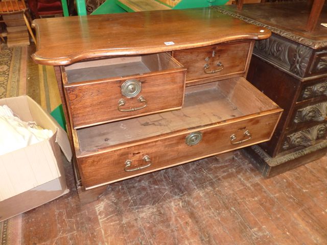 A small early 19th century teakwood chest of two long and two short drawers with pronounced and - Image 2 of 2