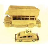 A matchstick model of a 20th century double decker bus, 37 cm long x 26 cm tall together with a