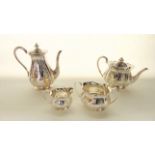 An assembled Victorian silver four-piece tea set, Atkin Brothers, London & Sheffield, 1894 - 1897,