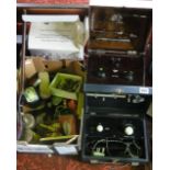 Two 20th century cased electrotherapy assemblies, one with bakelite interior casing and glass