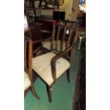 A set of eight (6&2) Edwardian mahogany Regency style dining chairs with fleur-de-lis splats,