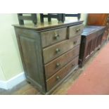 A Georgian oak country made chest of three long and two short drawers with embossed brass plate