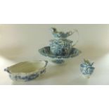 An early 20th century Wood & Son jug and basin set with scrolling moulded detail and blue printed