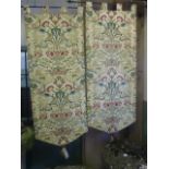 A pair of good quality tapestry style wall banners on ironwork rails