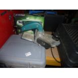 A cased Dremel sander F013-6000R, a Parkside heat gun PHLG 2000 B1, a Black and Decker electric