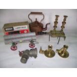 A collection of metalwares to include a pair of antique brass candlesticks, a pair of brass