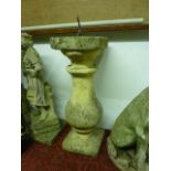 A weathered cast composition stone sundial with baluster column, 86cm high (excluding dial and