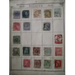 A Lincoln stamp album including early issues from Great Britain, Commonwealth and world stamps,