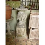 A good quality weathered composition stone sundial, the baluster shaped column with classical