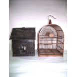 A songbird cage of timber construction, of arched form with internal perch, 48 cm tall approx