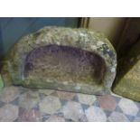 A shallow but thick walled weather natural stone D-end trough, 78cm long, 50cm wide, 28cm deep