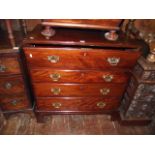 A small good quality Georgian mahogany secretaire chest fitted with four long graduated drawers, the