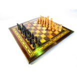 A good quality timber chess set (complete), the pieces in suites of ebony and fruit wood, all well