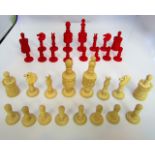 A complete antique eastern ivory chess set all with hand carved and turned pieces, half stained red,