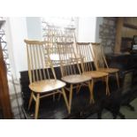 A set of six light Ercol elm and beechwood high stick back dining chairs with cow horn rails and