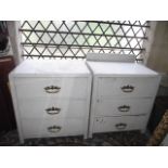 A pair of painted oak three drawer bedroom chests containing a quantity of miscellaneous hand