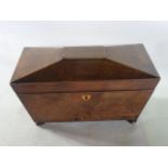 A 19th century sarcophagus shaped tea caddy, veneered principally in mahogany with a satinwood