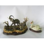A substantial Worcester Ornamental Studio limited edition group of elephants at a watering hole with