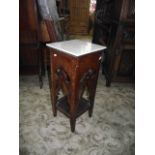 An arts and crafts style oak plant stand of square cut form with associated white and grey flecked