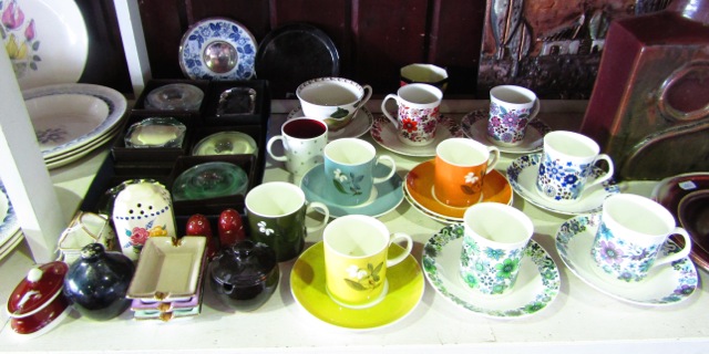 A collection of ceramics including three Wedgwood Susie Cooper design coffee cans and saucers in