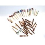 A collection of bone work and turned timber bobbins, one named Francis - (over 40)