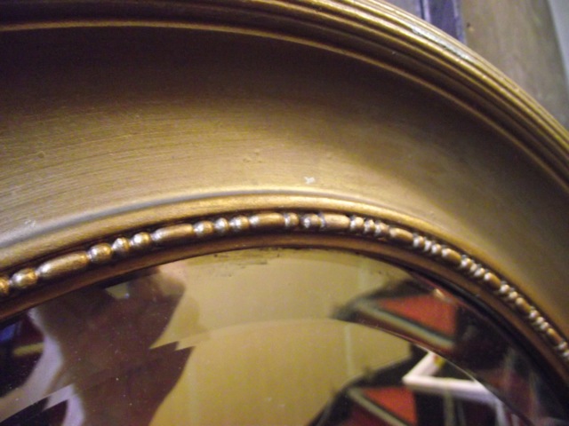 An Edwardian gilt frame wall mirror of oval form with bevelled edge plate and moulded surround, - Image 2 of 2