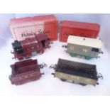 A collection of Hornby 0 gauge tin plate railway items to include a boxed LMS No 1 tank