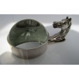 A silver plated desk magnifier with horses' head finial handle by Hermes, the plated mount