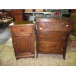 A small reproduction oak bedroom chest of three long drawers with shaped outline, together with a