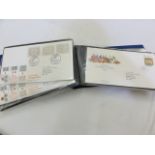 Three A4 folders containing a collection of First Day Covers mainly dating from the 1980s together