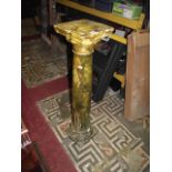 A vintage plaster column with sage green painted finish to simulate marble, with square moulded