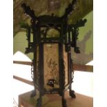 A hexagonal timber framed Chinese lantern with painted panels depicting birds amongst foliage and
