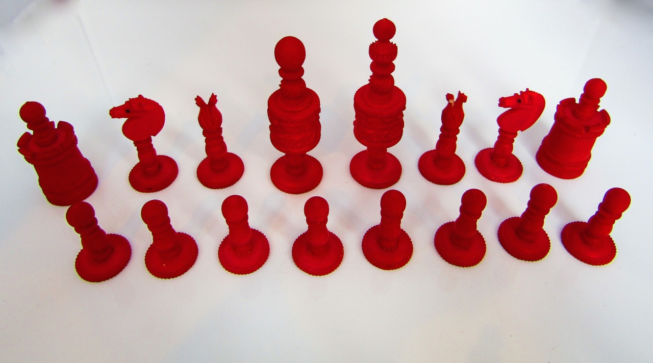 A complete antique eastern ivory chess set all with hand carved and turned pieces, half stained red, - Image 2 of 3