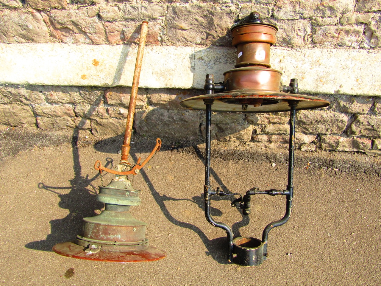 A Great Western Railway Gas Station lamp together with a further gas lamp on high steel column