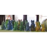A collection of fourteen ceramic rabbits in various blue, green and buff glazes including Sylvac