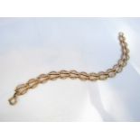 A 9ct gold bracelet, composed of stylised circular links, 8.2g