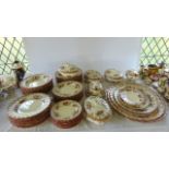 An extensive collection of 19th century Oriental Ivory Ashley pattern dinnerwares with red and brown