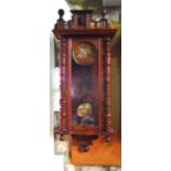 A 19th century Vienna style wall clock, the case work with split spindle mouldings set beneath a