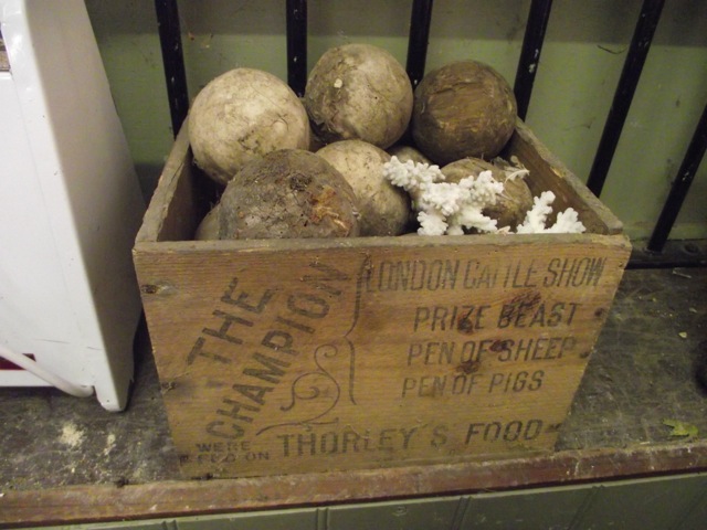 A small vintage wooden packing crate advertising Joseph Thorley Ltd, Kings Cross, London