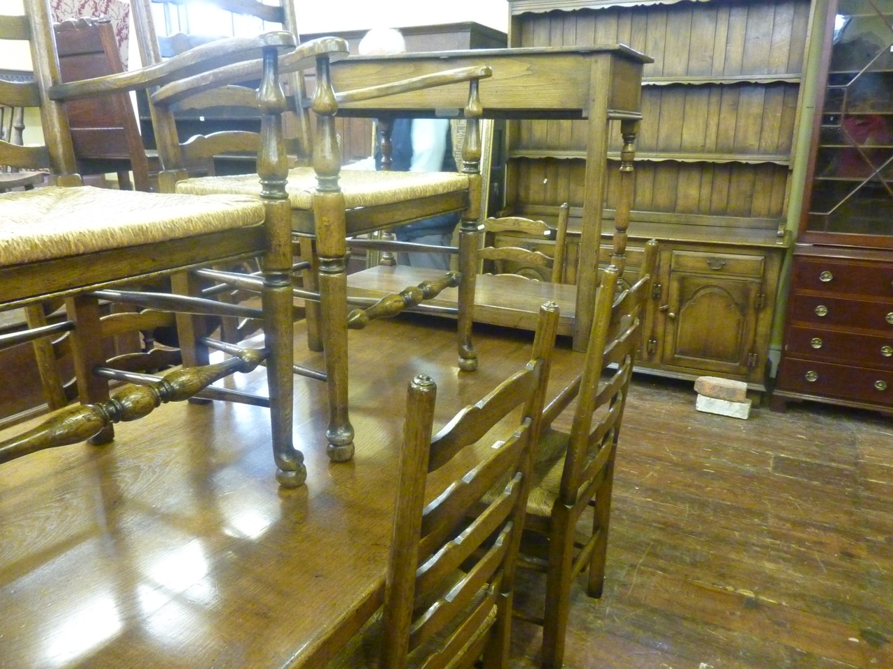 A good quality reproduction oak refectory table in the old English style, by Titchmarsh and Goodwin, - Image 6 of 6