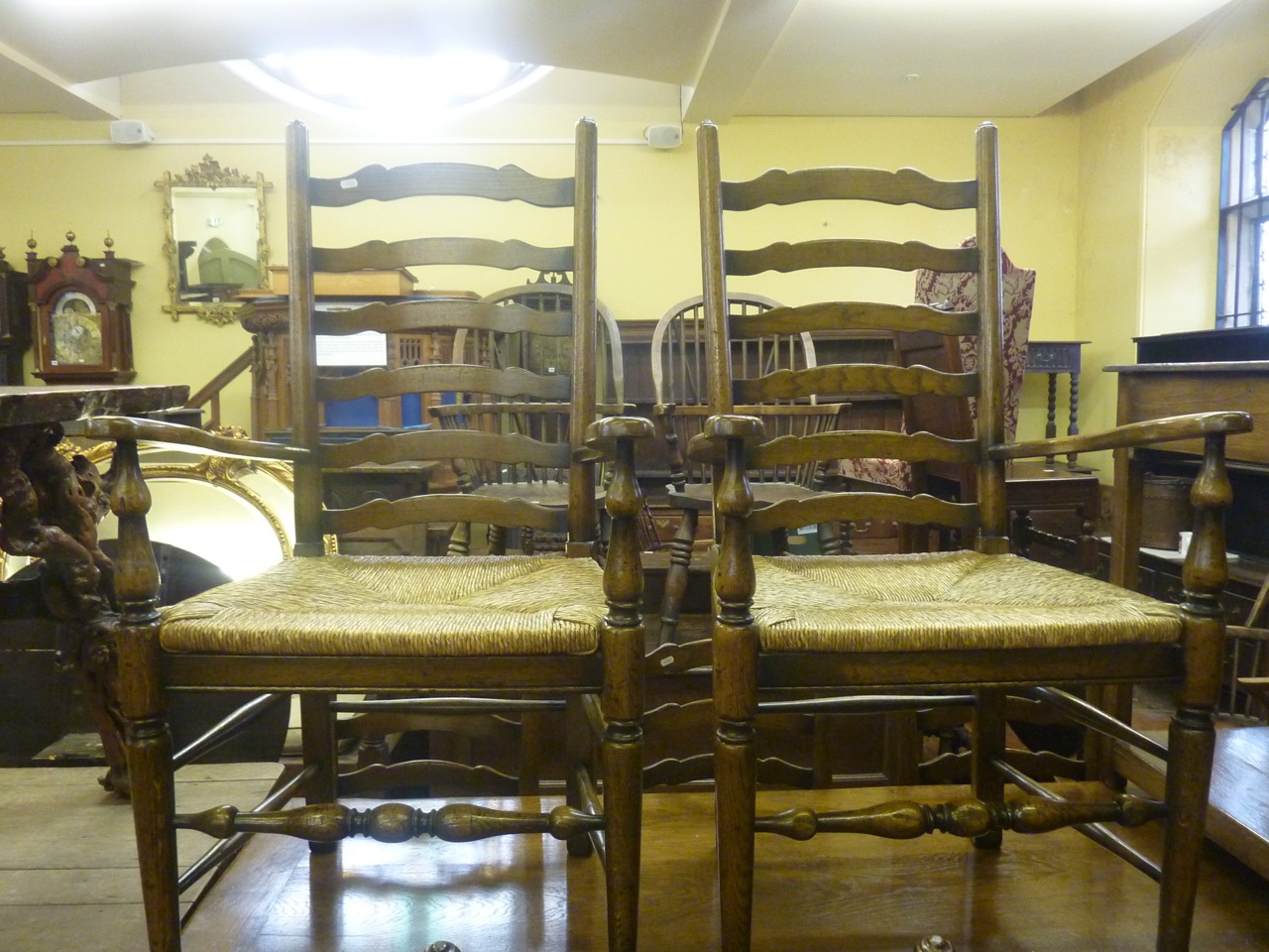 A good quality reproduction oak refectory table in the old English style, by Titchmarsh and Goodwin, - Image 2 of 6