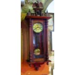 A 19th century walnut Vienna regulator wall clock, the case work with split spindle mouldings set