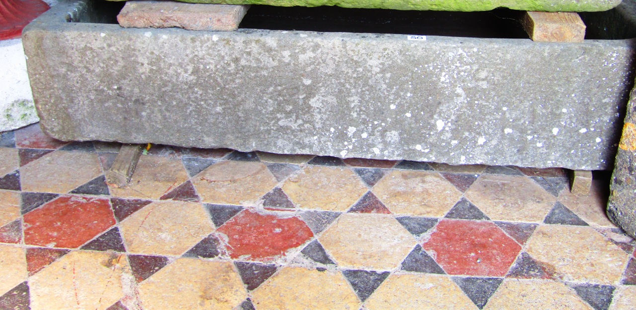 A good example of a shallow rectangular natural stone trough with single rounded corner, 120 cm long