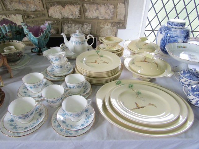 A collection of Royal Doulton The Coppice dinnerwares pattern number 5803 comprising: three oval